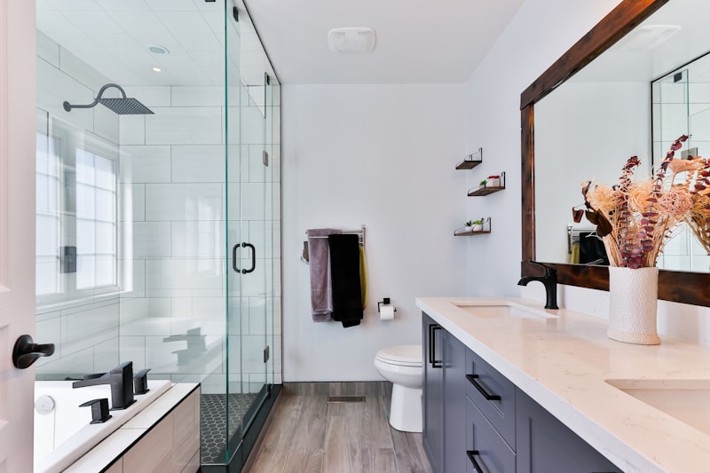 Pristine white ceramic modern basin with aligned mixer chrome fixtures